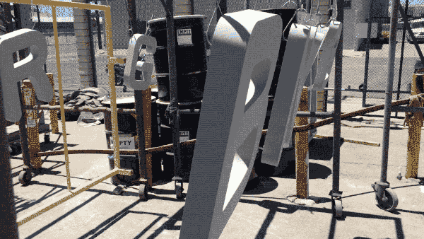 short .gif of fabricated aluminum letters prior to painting