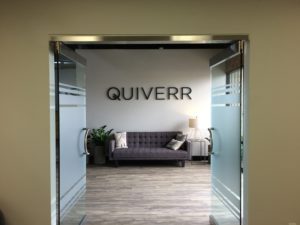 piture of a dimensional lobby sign from conference room doors with etched glass