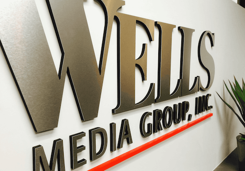 Brushed aluminum letters make up this dimensional lobby sign