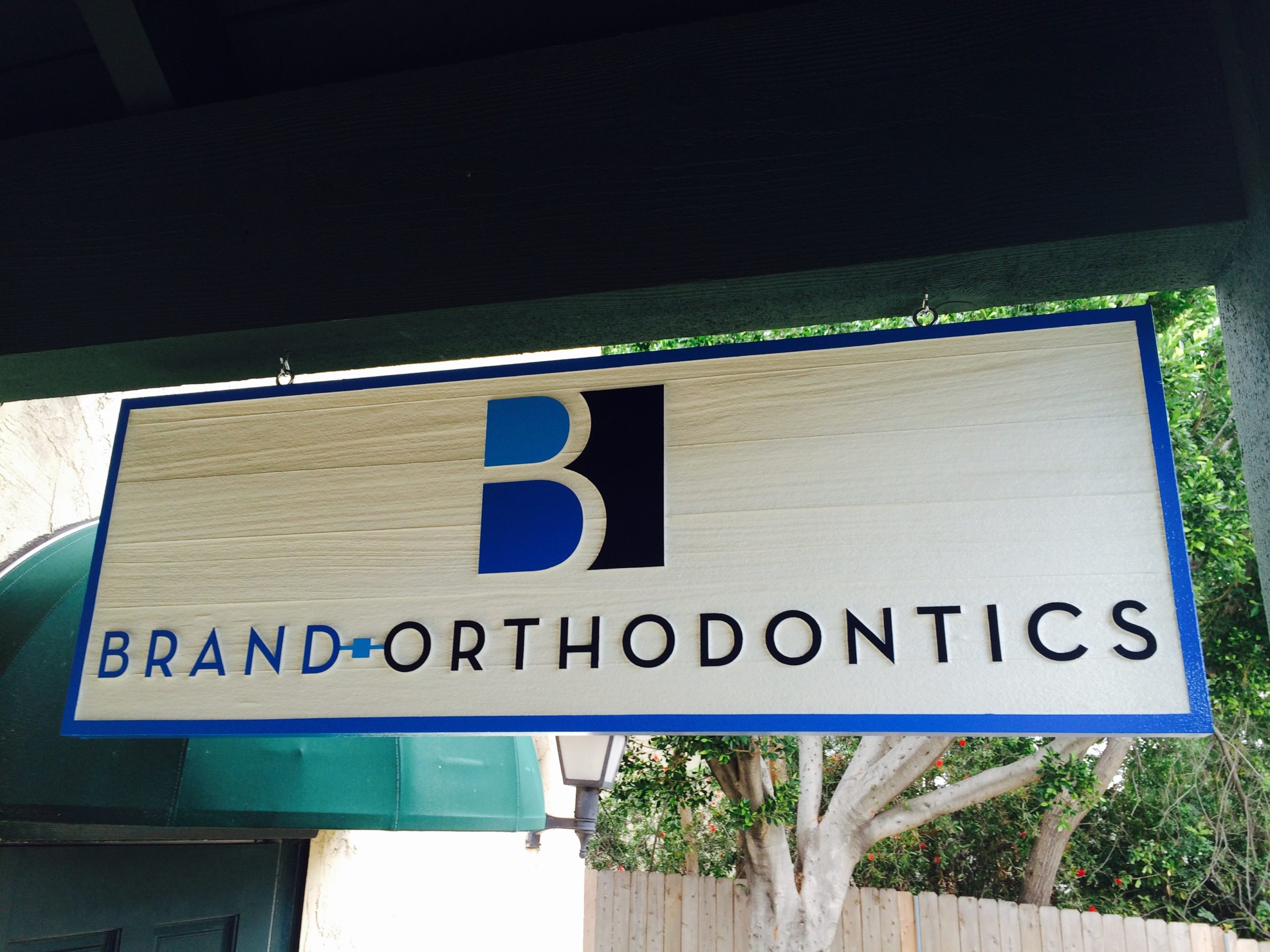 hanging sandblasted sign