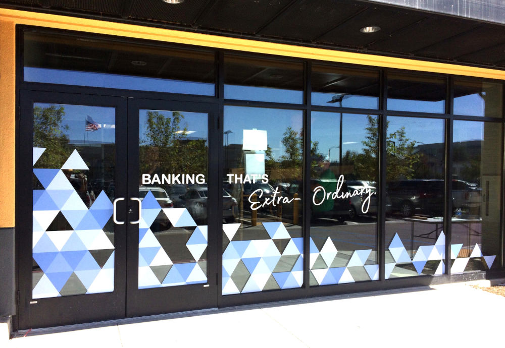 Vinyl lettering and colorful graphics on business doors exterior windows